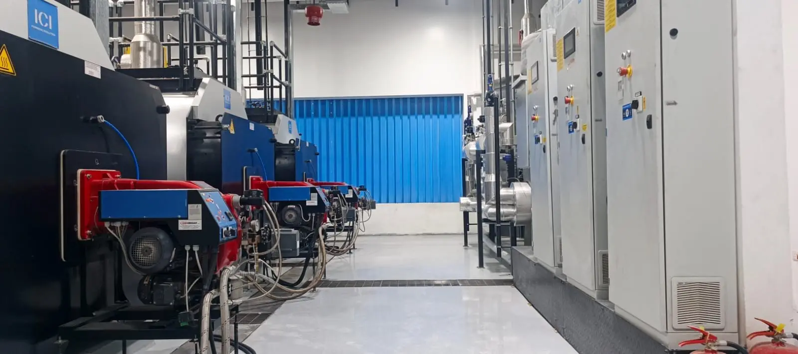 Boiler plant and electrical panels in a utility hall