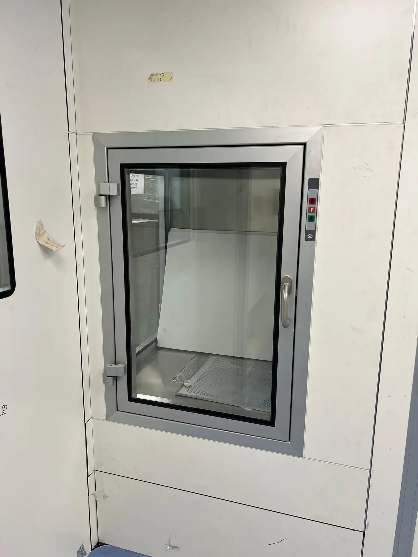 Stainless pass box in a cleanroom wall